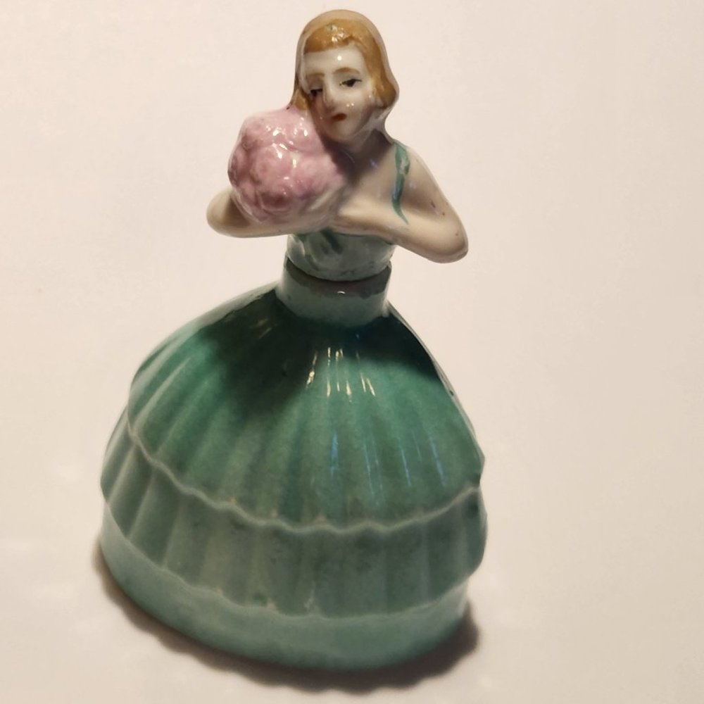 VINTAGE LADY IN GREEN HOLDING PINK FLOWERS PERFUME BOTTLE-GERMANY #1130